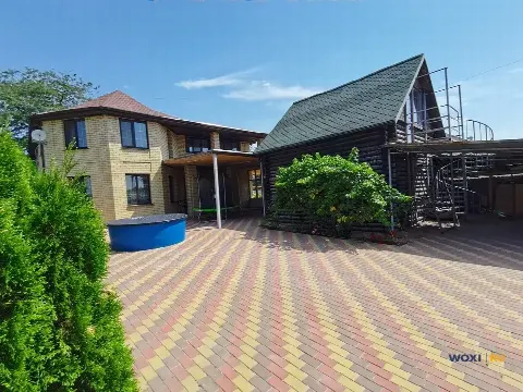 Дом 256 м² на участке 5 сот.