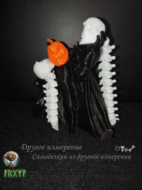 Всадник без головы, но с тыквой (тыква и череп с подвижными позвонками)